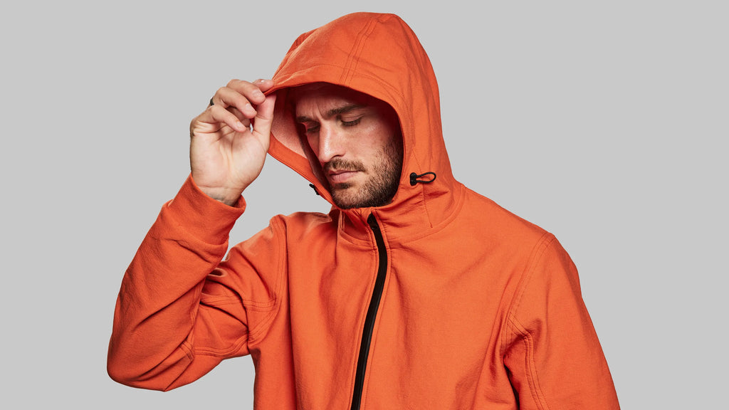 Indestructible Hooded Jacket. International Orange edition Vollebak